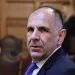 Συνθήματα για τη Μέση Ανατολή στην πολυκατοικία όπου στεγάζεται το δικηγορικό γραφείο του Γ. Γεραπετρίτη